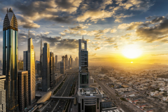 modern-buildings-against-cloudy-sky-sunset